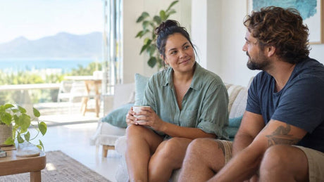 Happy couple discuss STI tests in Queensland