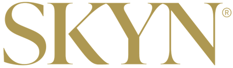 SKYN condoms logo in gold lettering