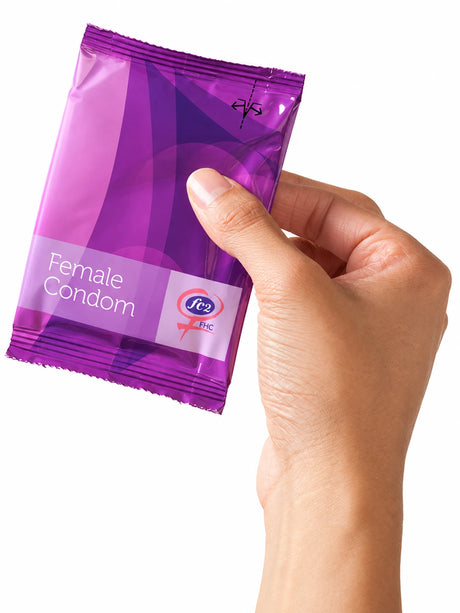 Femidom FC2 condom being held in ladies hand