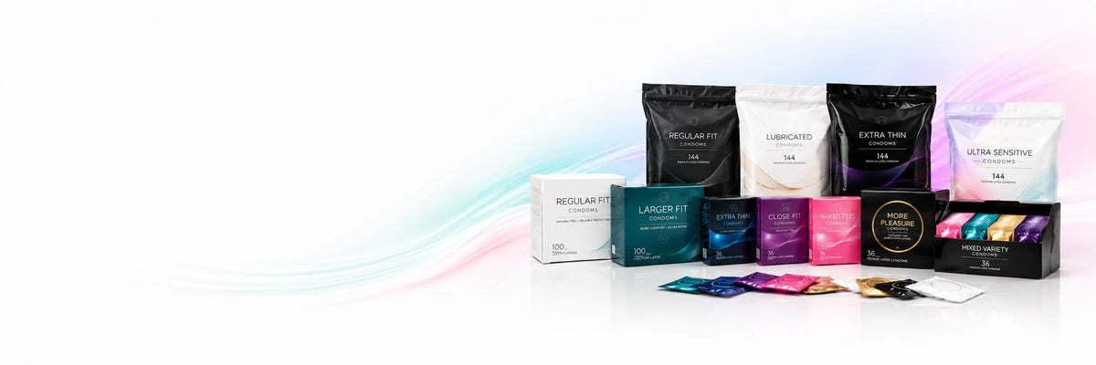 A collection of assorted bulk condoms in various colours and quantities.