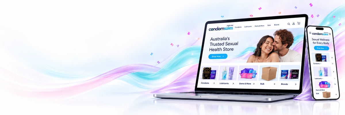 A laptop and a smartphone displaying the new Condom Sales website, set against a clean white background with soft pastel blue and pink abstract wave graphics.